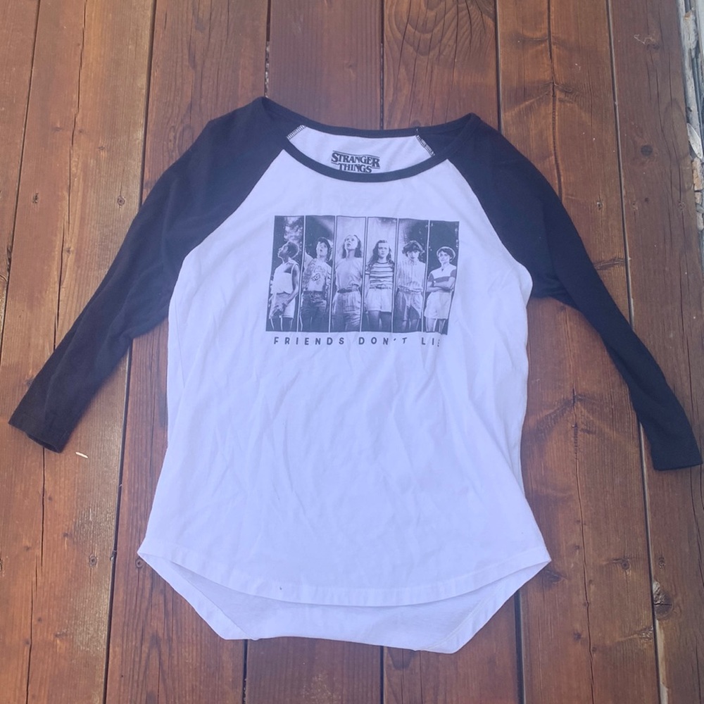 Stranger Things โfriends donโt lieโ tee